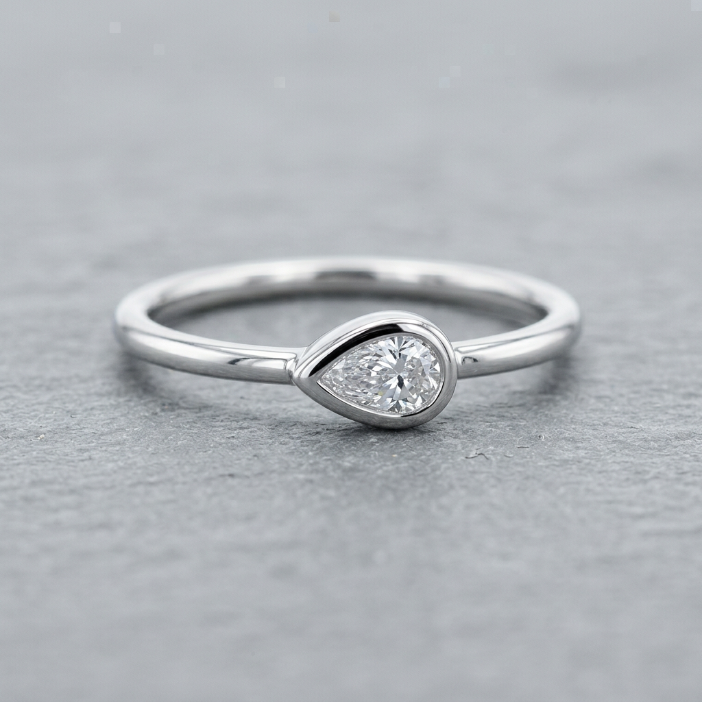 10k White Gold Pear Shape Diamond Bezel Stacker Ring | 0.10ct | Whistler Keepsake
