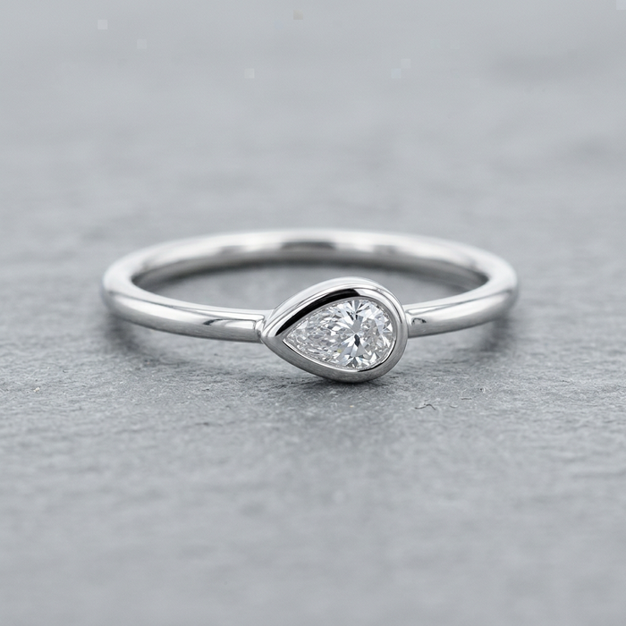 10k White Gold Pear Shape Diamond Bezel Stacker Ring | 0.10ct | Whistler Keepsake