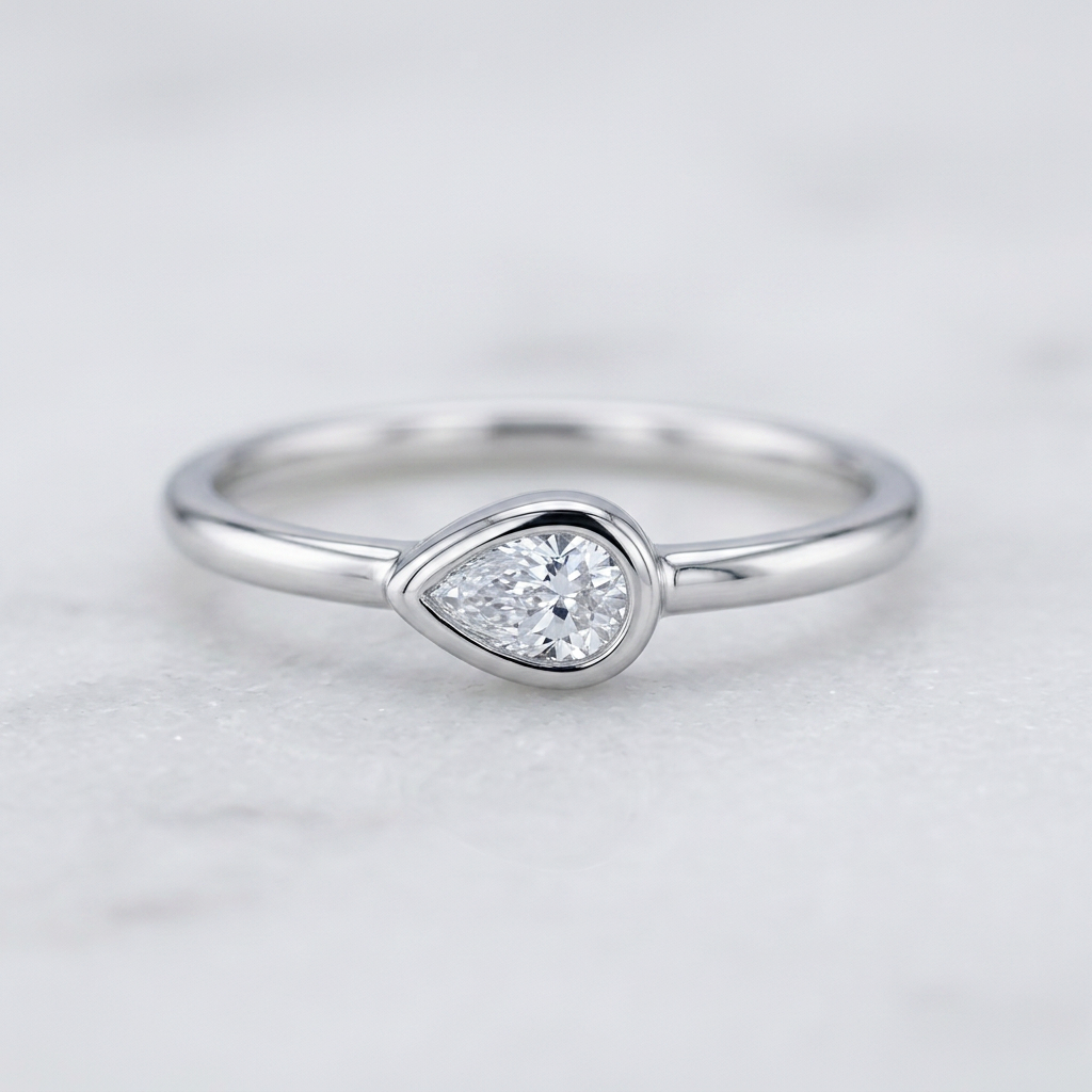 10k White Gold Pear Shape Diamond Bezel Stacker Ring | 0.10ct | Whistler Keepsake