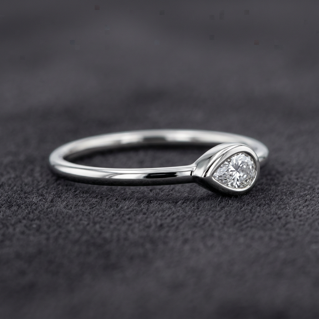 10k White Gold Pear Shape Diamond Bezel Stacker Ring | 0.10ct | Whistler Keepsake